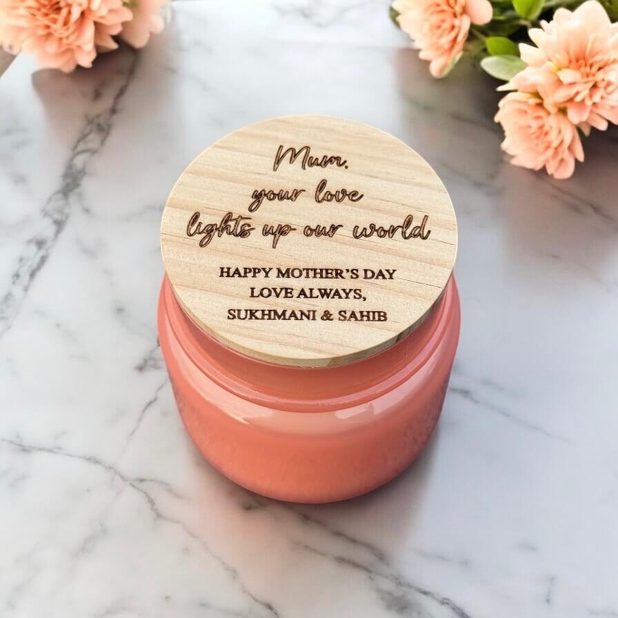 Personalised engraved candle with wood lid, perfect Mother’s Day gift on marble surface