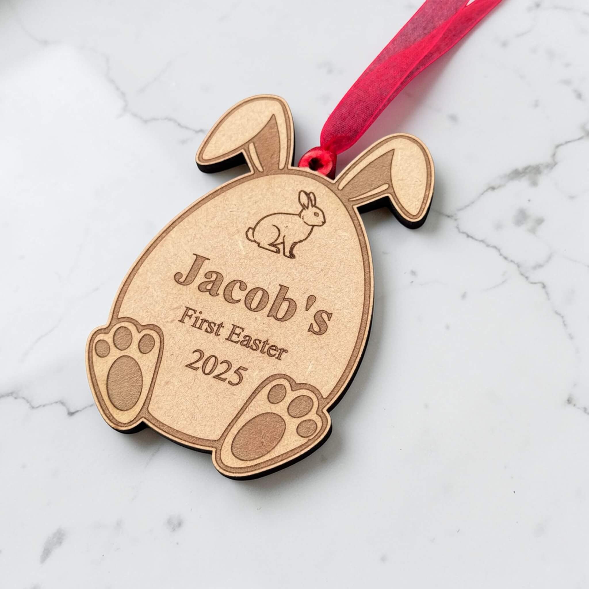 Personalised first Easter wooden tag engraved with name and year, Easter bunny shaped keepsake ornament with ribbon hanging