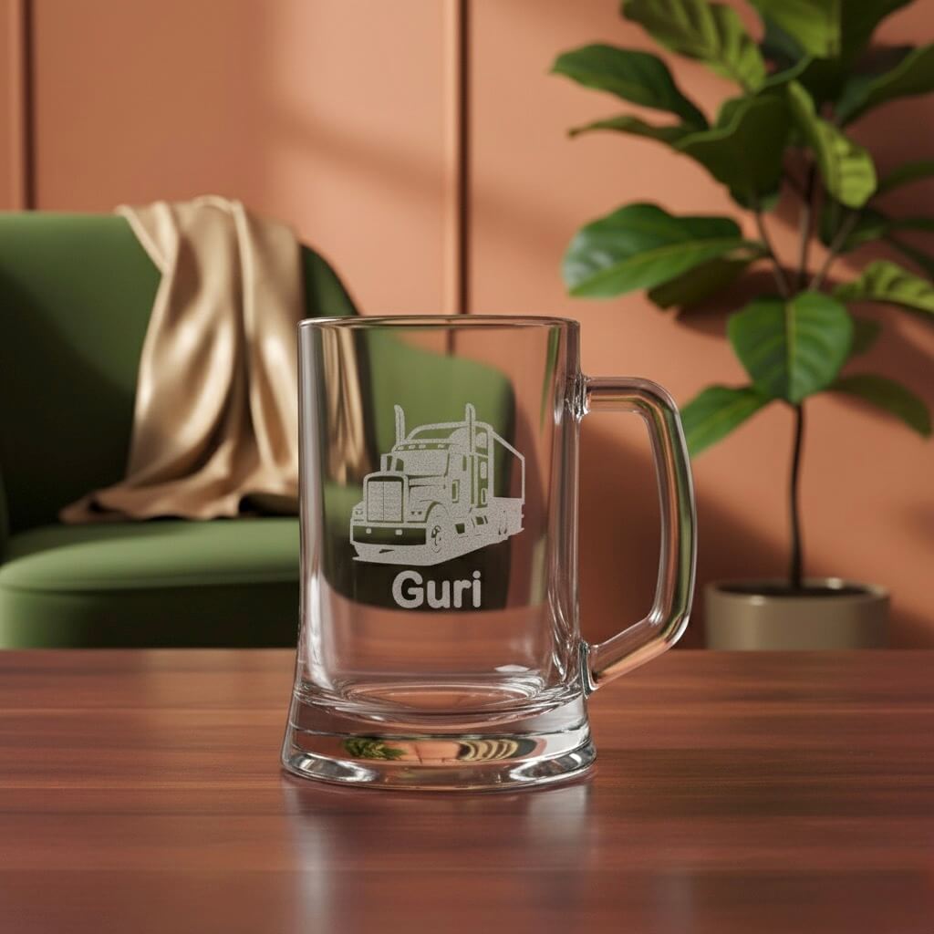Personalised glass beer mug engraved with truck design and name Guri, displayed on wooden table in modern living room