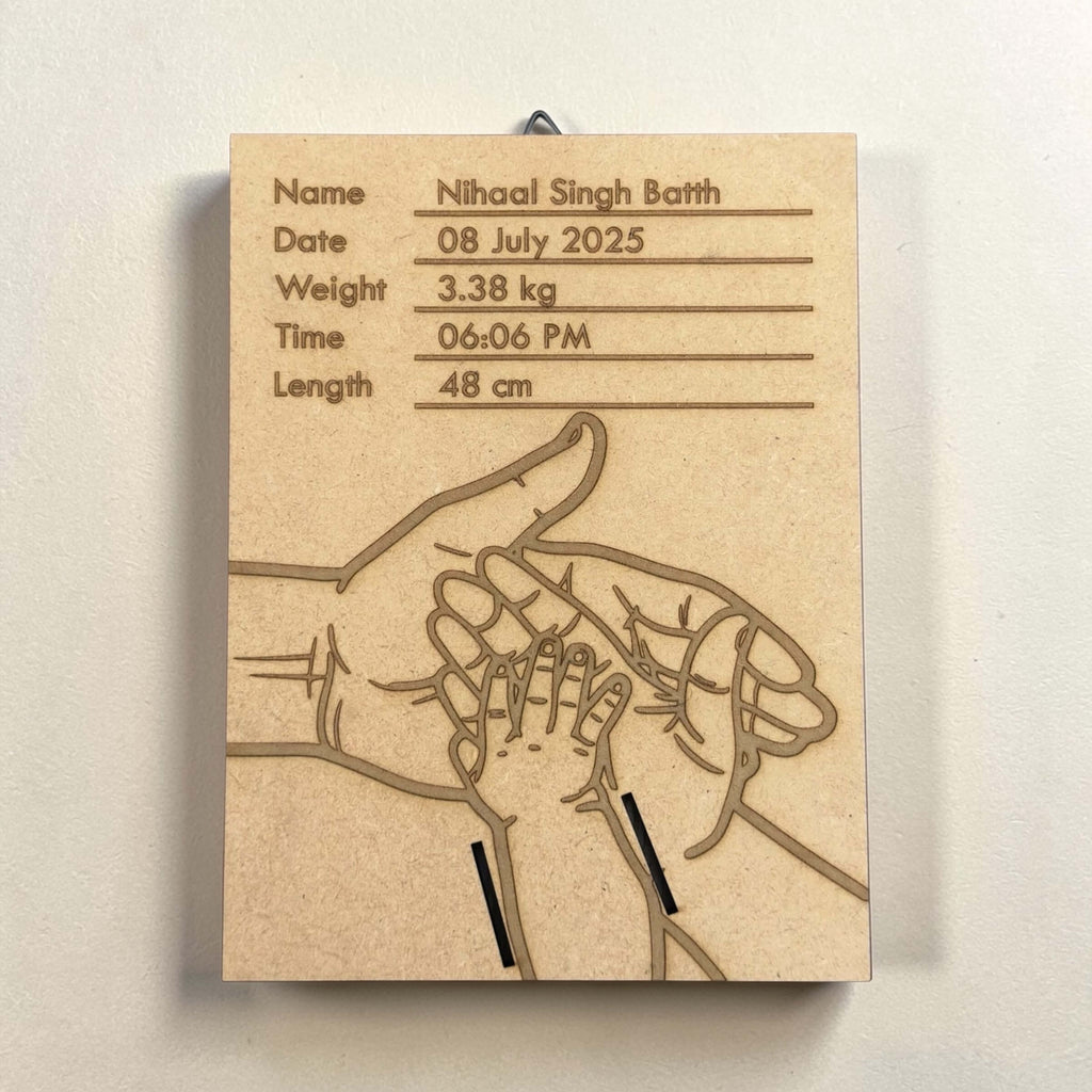 Personalised newborn keepsake plaque with engraved birth details on MDF