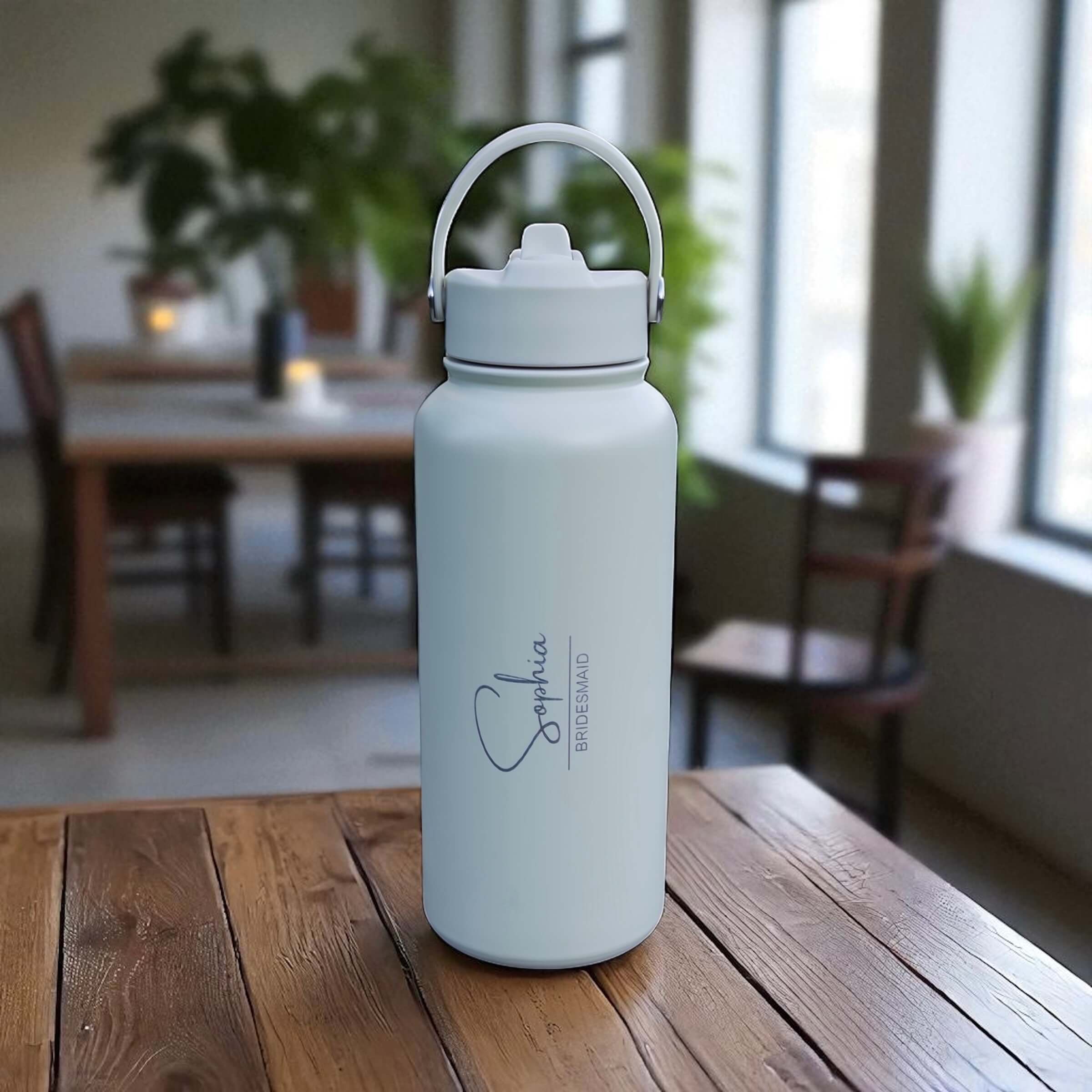 Personalised stainless steel bridesmaid water bottle engraved with name.