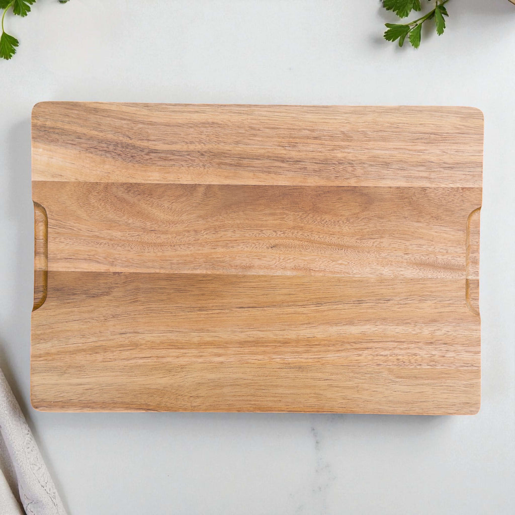 Premium acacia chopping board with smooth finish, versatile kitchen cutting board or serving platter made from sustainable hardwood.