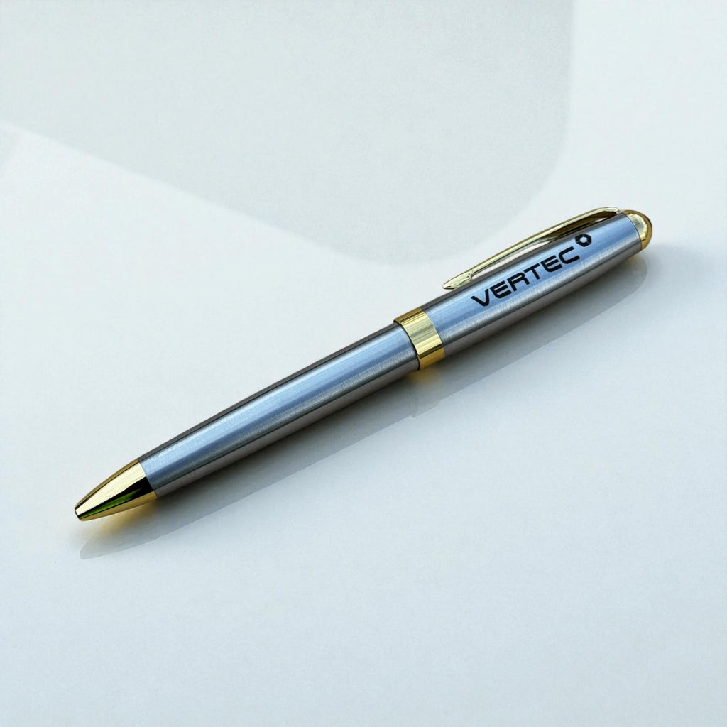 Silver and gold pen engraved with company logo on a light Gray background
