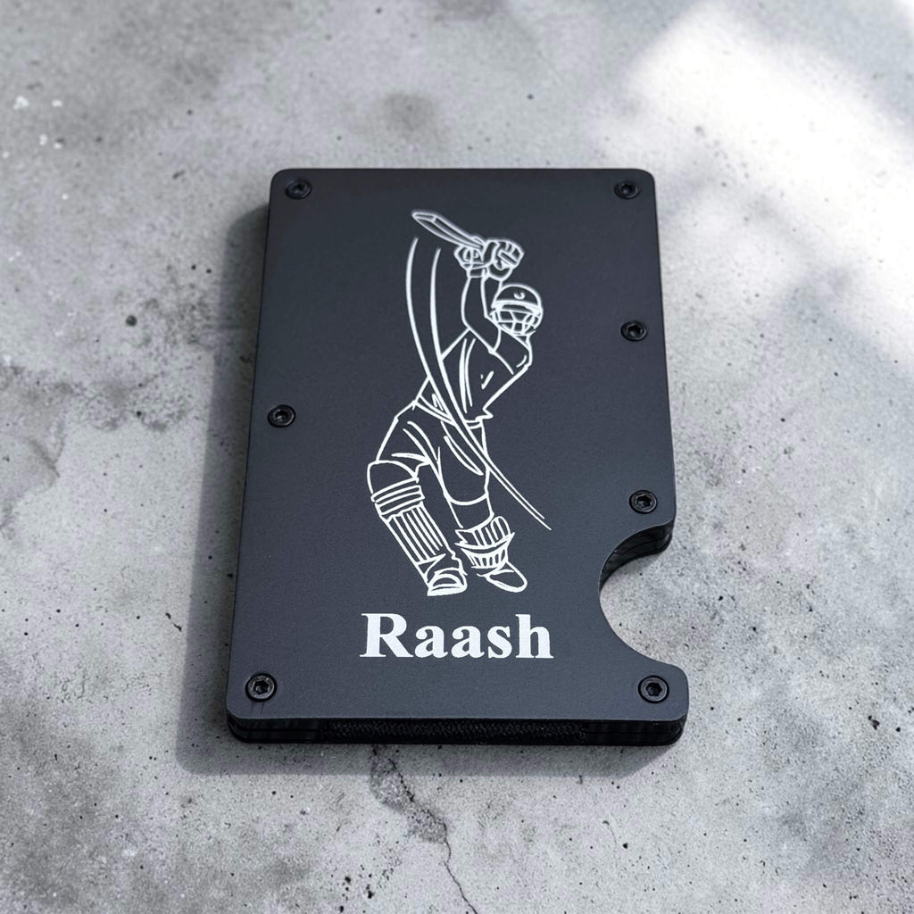 Slim aluminium card holder featuring a custom engraved graphic and personalised name