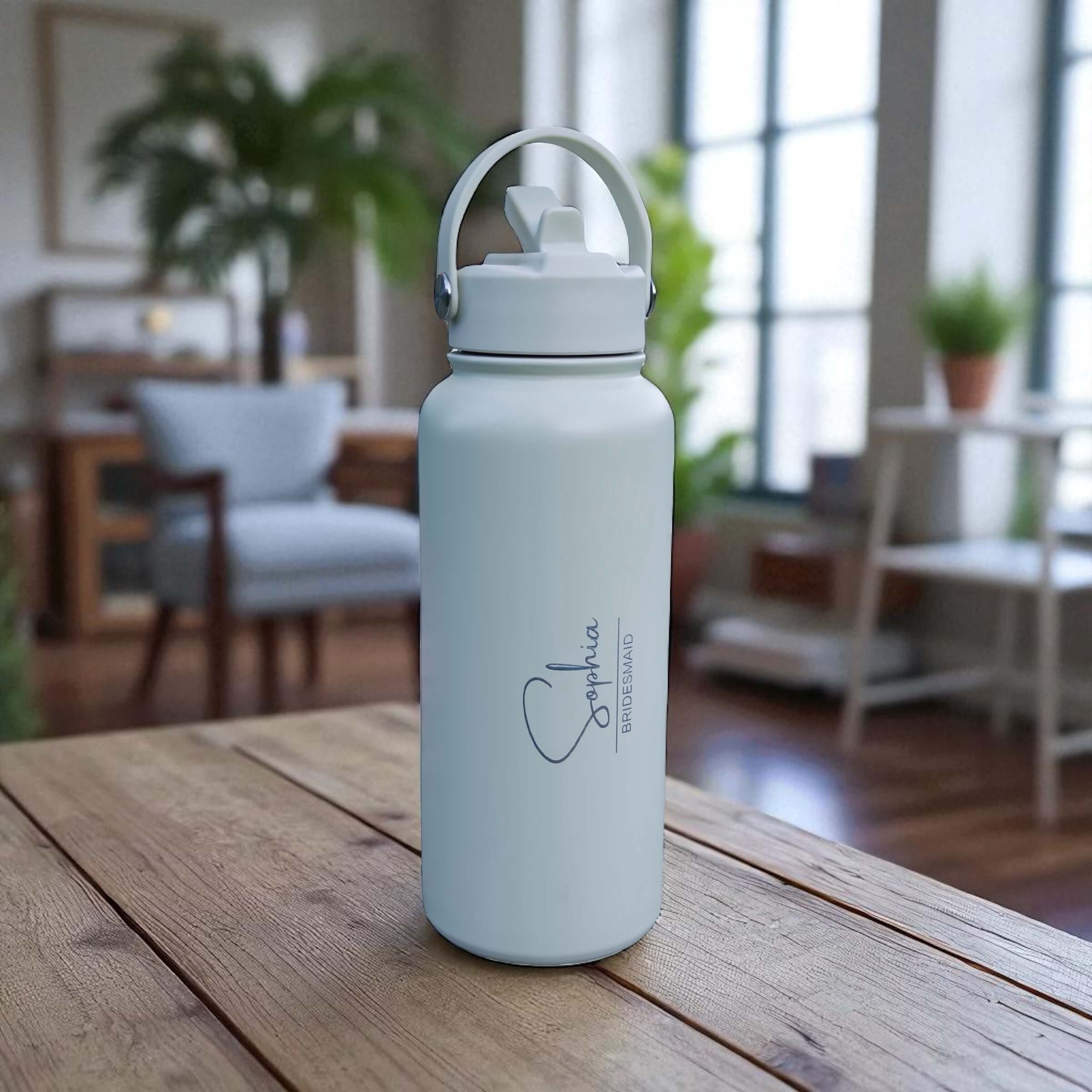 Stainless steel bridesmaid water bottle displayed as wedding keepsake.