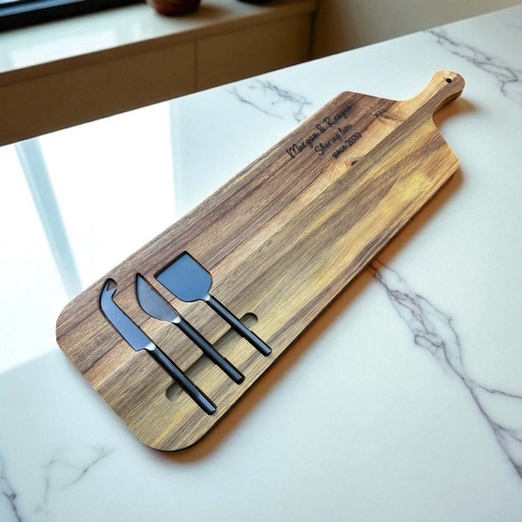 Stylish anniversary cheese board with custom names and date, ideal as a meaningful wedding or engagement gift.