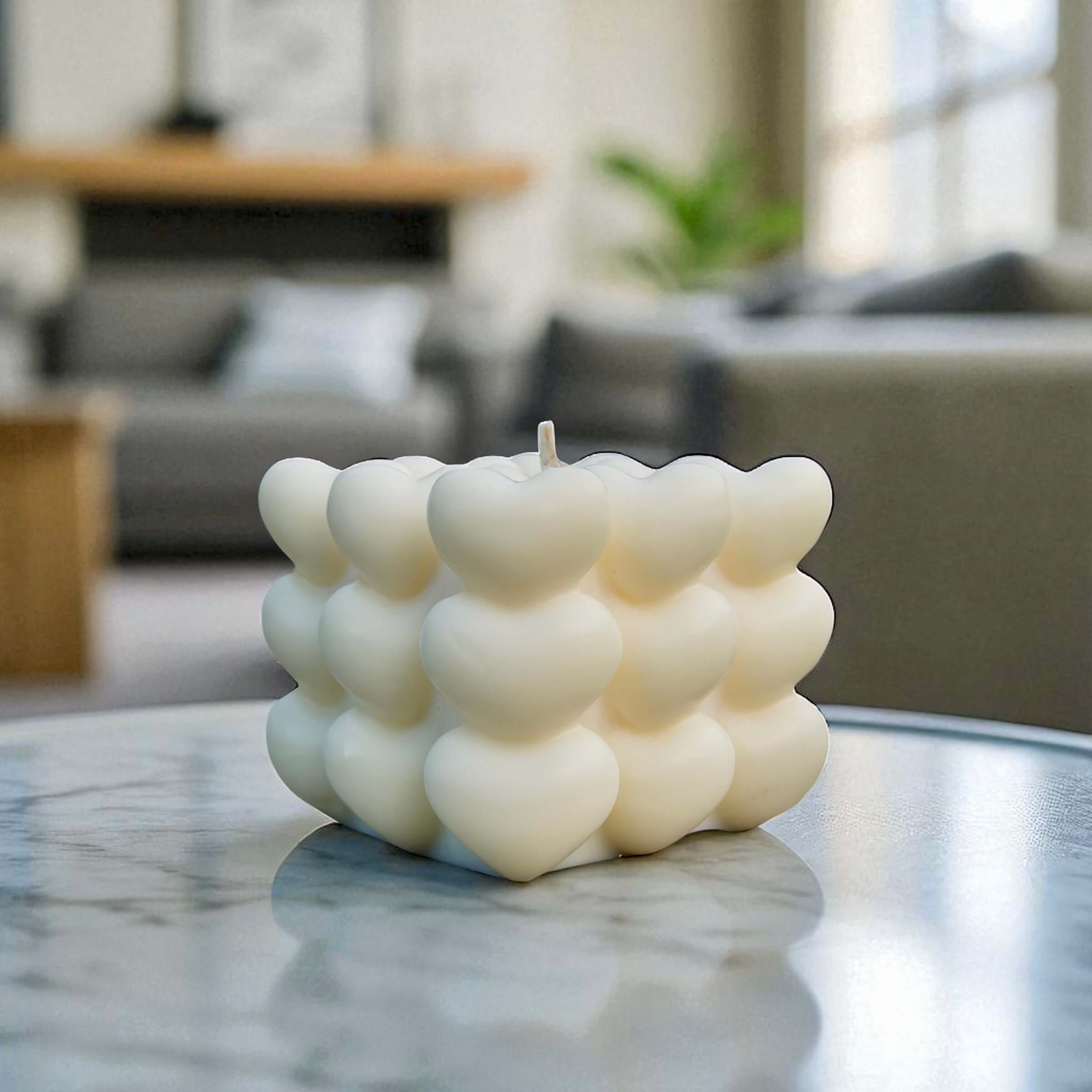 White heart cube candle with 3D heart design, handmade scented decor for romantic or minimalist spaces