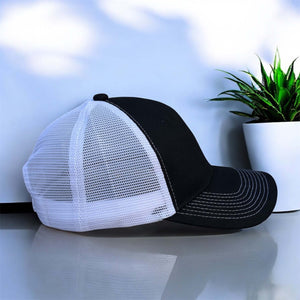black and white cap from side
