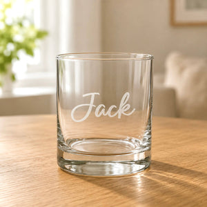 Close-up of personalised scotch glass with frosted Jack name and thick clear base
