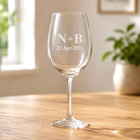 Engraved wedding wine glass with N and B initials and wedding date