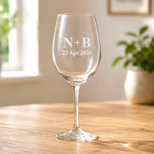 Engraved wedding wine glass with N and B initials and wedding date