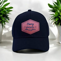 engraved cap with PU leather patch that has name 