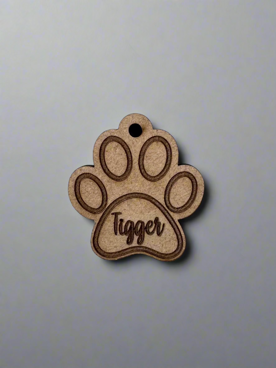 engraved wooden cat id tag in cat paw shape with name