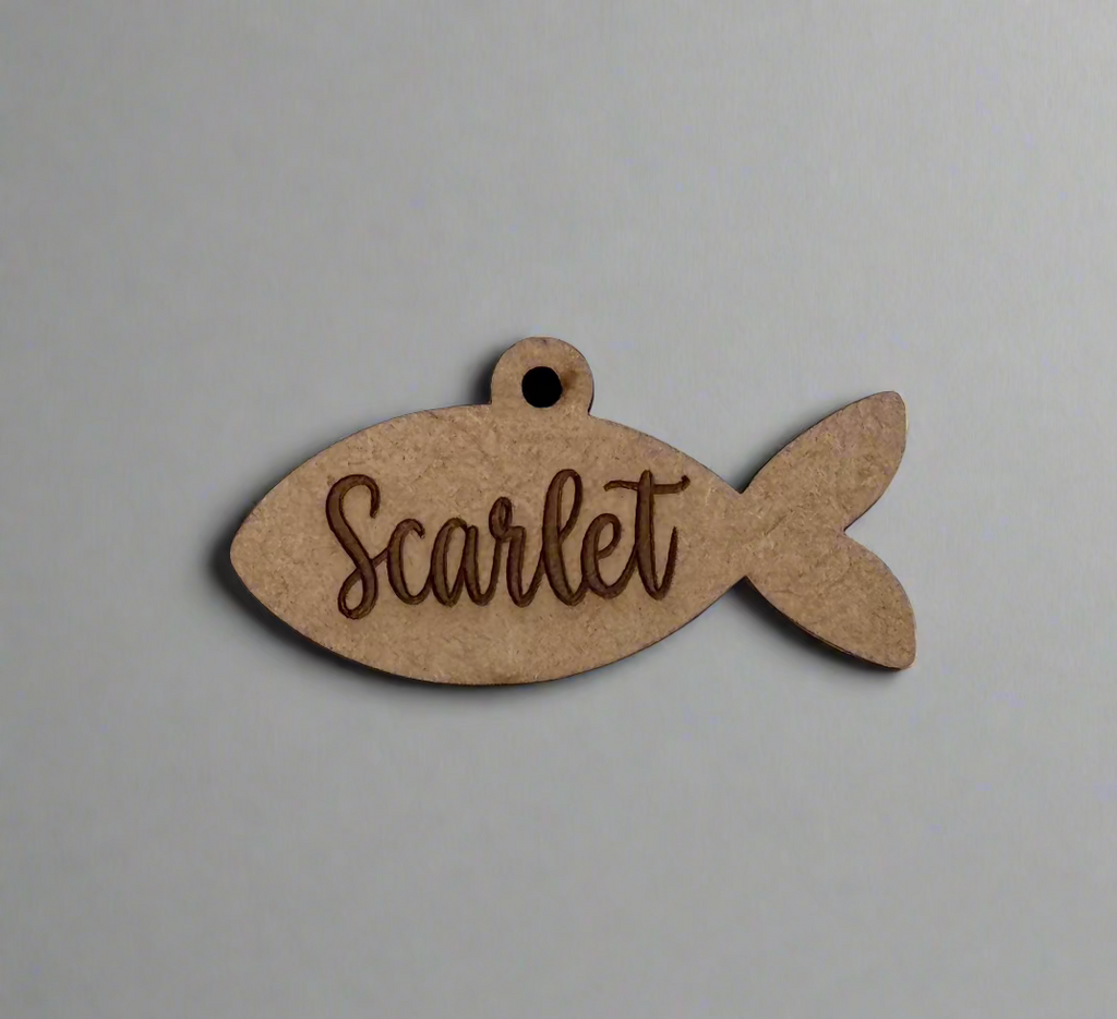 engraved wooden cat id tag in fish shape
