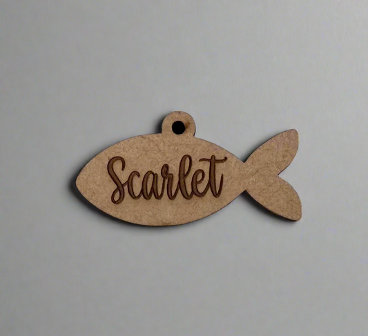 engraved wooden cat id tag in fish shape
