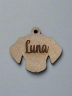 engraved wooden dog id tag in dog face shape with name