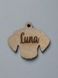 engraved wooden dog id tag in dog face shape with name