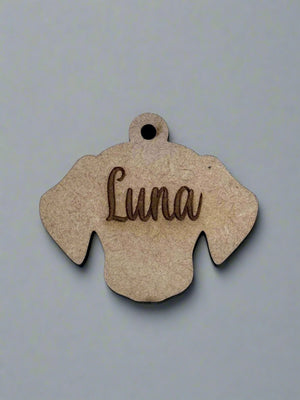 engraved wooden dog id tag in dog face shape with name