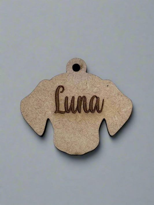engraved wooden dog id tag in dog face shape with name