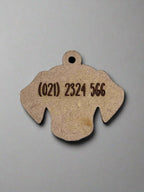engraved wooden dog id tag in dog face shape with number