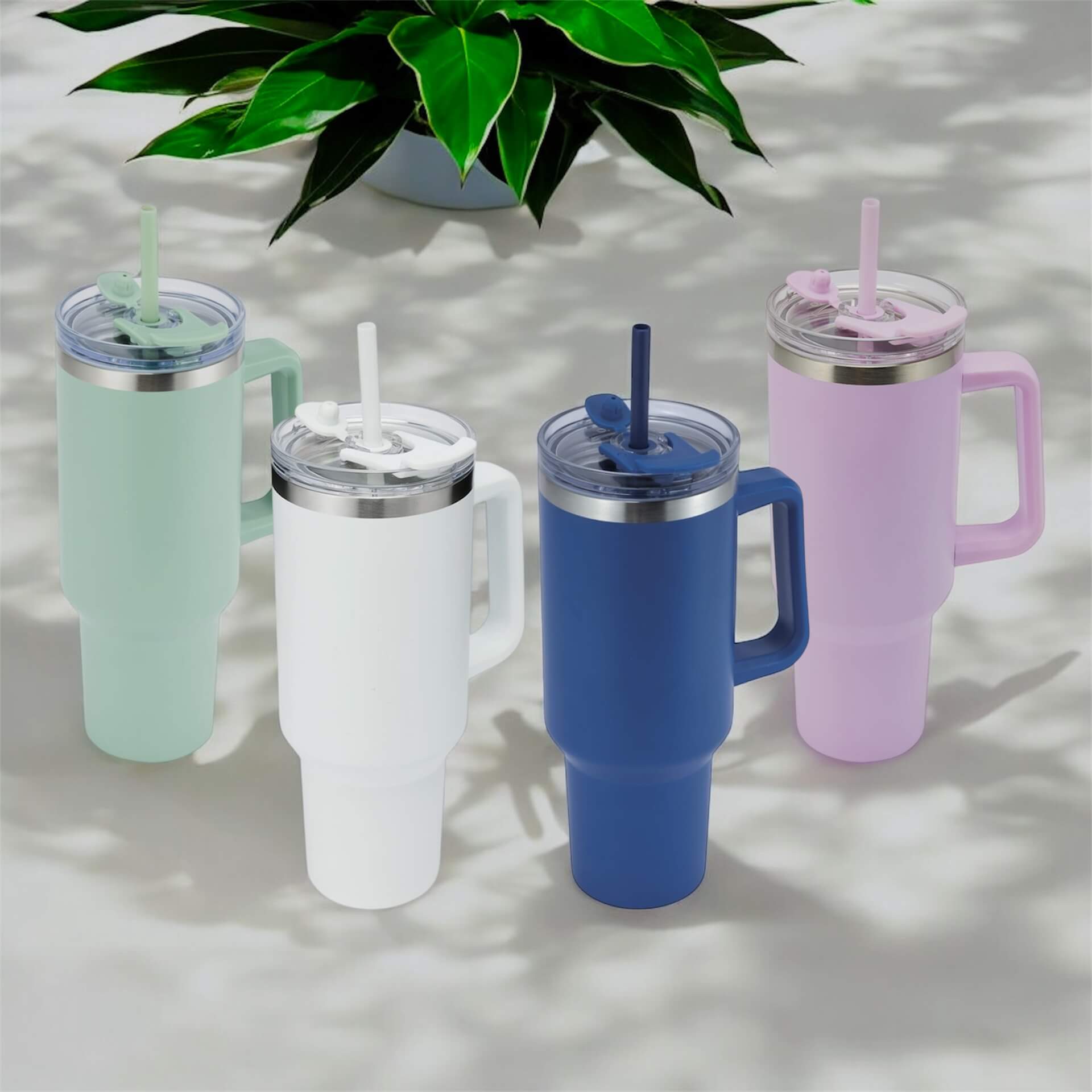 four engraved stainless steel water bottle in different colours