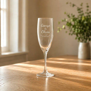 Personalised wedding champagne flute engraved with couple names and date