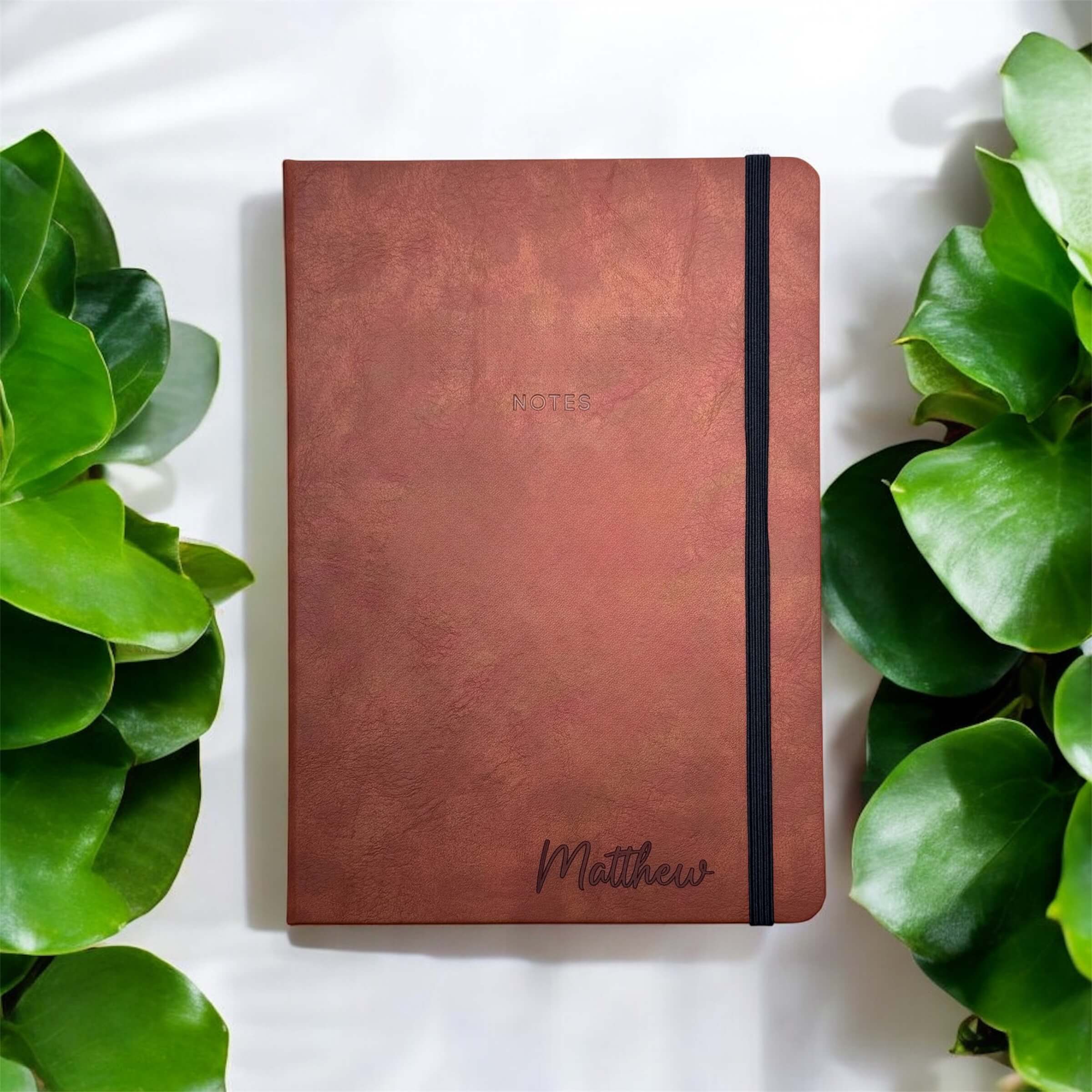 tan leather journal engraved with name